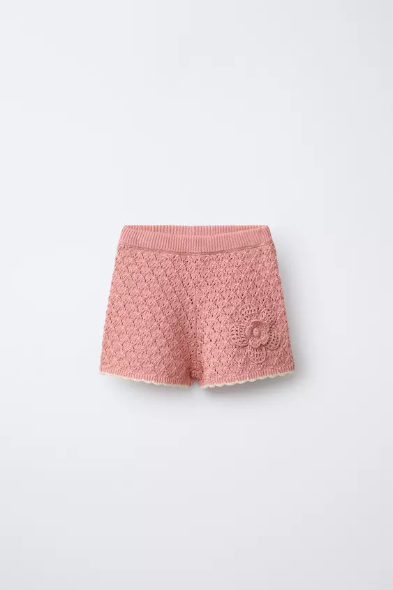 Knitted Bermuda shorts with an elastic waistband and floral appliqué on the front. | Zara UK