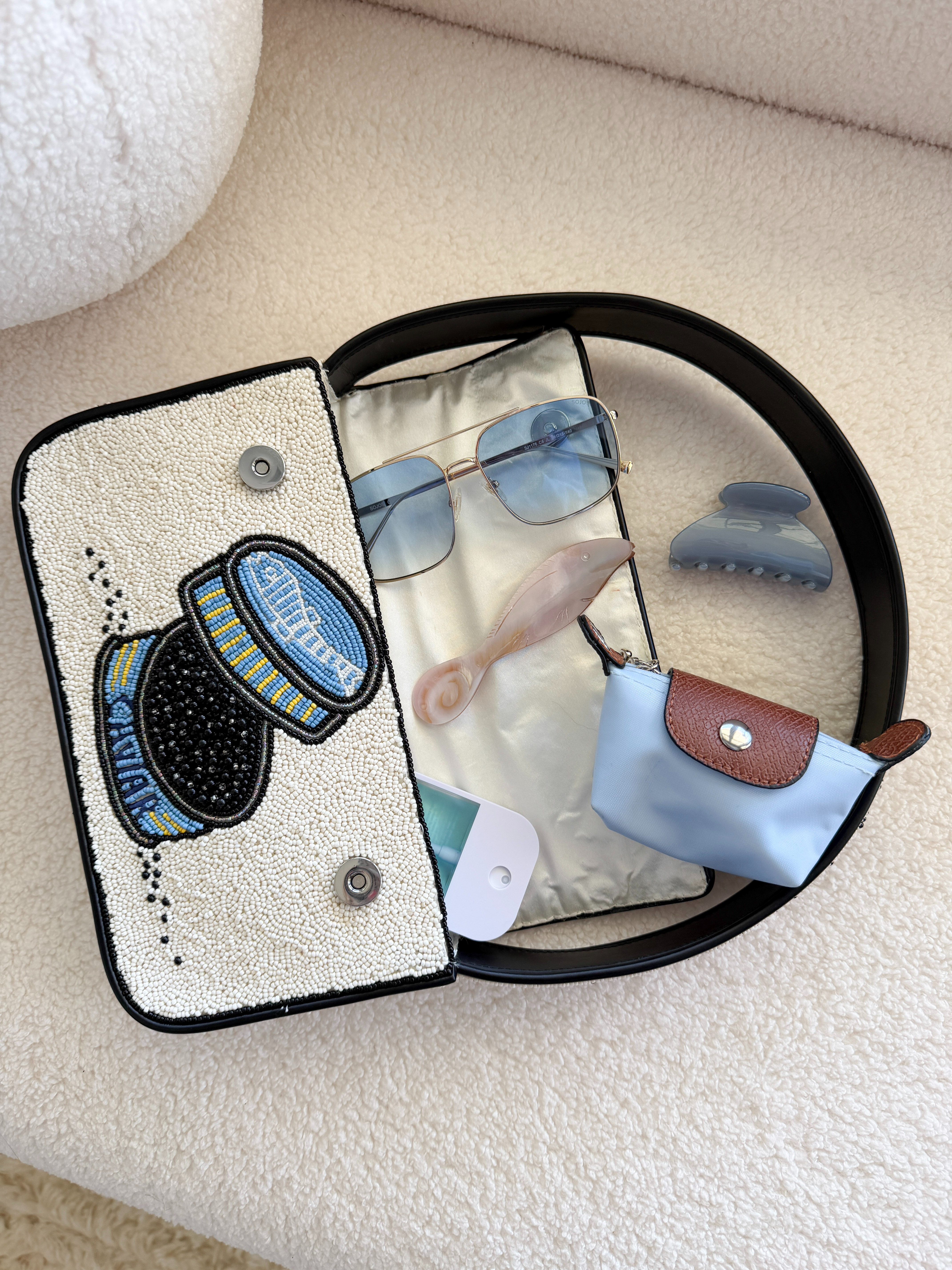 Team Lobster or Team Caviar? I love how much this bag holds while still looking polished, and it’s the perfect size for date nights, parties, weddings, vacations, or everyday errands. 

 #LTKgrwm #LTKootd #LTKBeauty