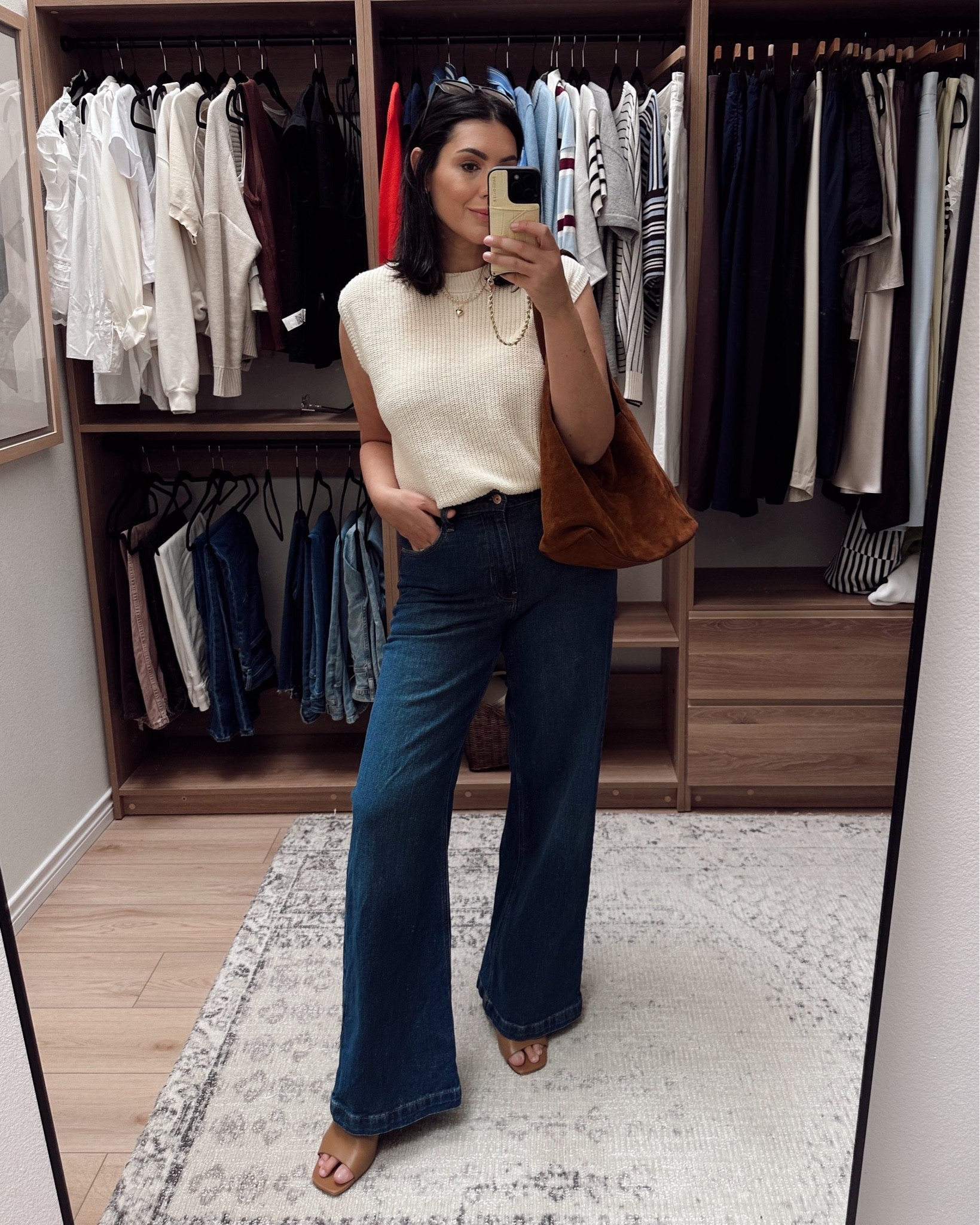 Trying to will fall the best I can. Paired this sleeveless sweater vest from @Quince with my favorite Gap jeans! I’m in the large of the top. 30 of the jeans.