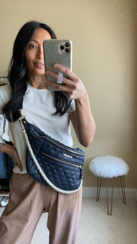 Travel bag. Sling bag. Available in this beautiful navy with navy and metal accessory strap.  Also available in other colors, as well as a smaller sling bag  

#LTKTravel #LTKOver40 #LTKItBag
