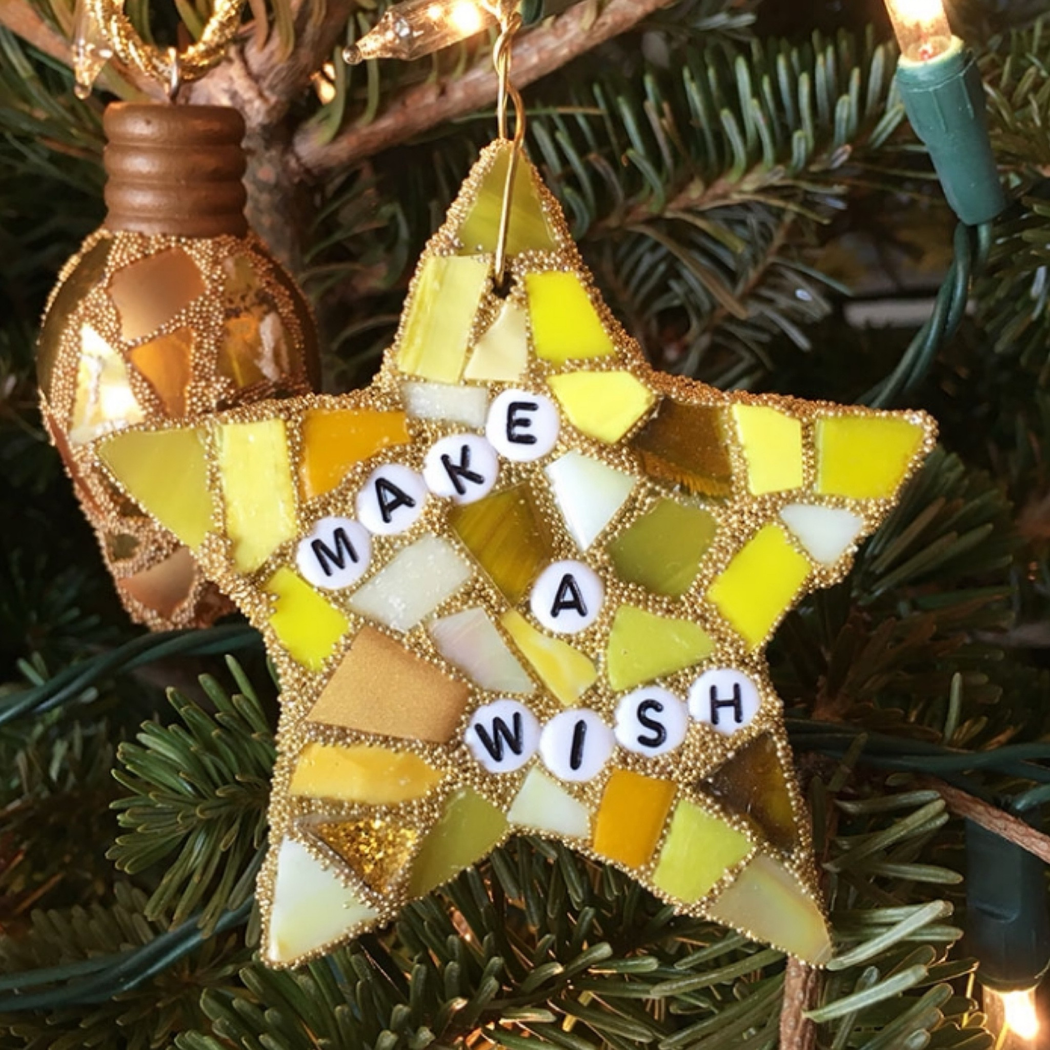 Sharing mosaic ornaments including a mixed media star and a broken glass ornament lightbulb. ⭐️💡 For mosaic tips, tutorials, inspiration, and so much more please visit my YouTube channel: YouTube.com/julieweilbacher. ⭐️💡 Follow @julieweilbacher on Instagram for all things mosaic art. make a wish - star - Christmas ornaments - glass ornaments - mixed media - lightbulb ornament - broken plate mosaics - mosaic ornament - hostess gift - tree trimming - tree decor - yellow ornaments - gold ornaments - stained glass ornaments 

#LTKhome #LTKSeasonal #LTKHoliday
