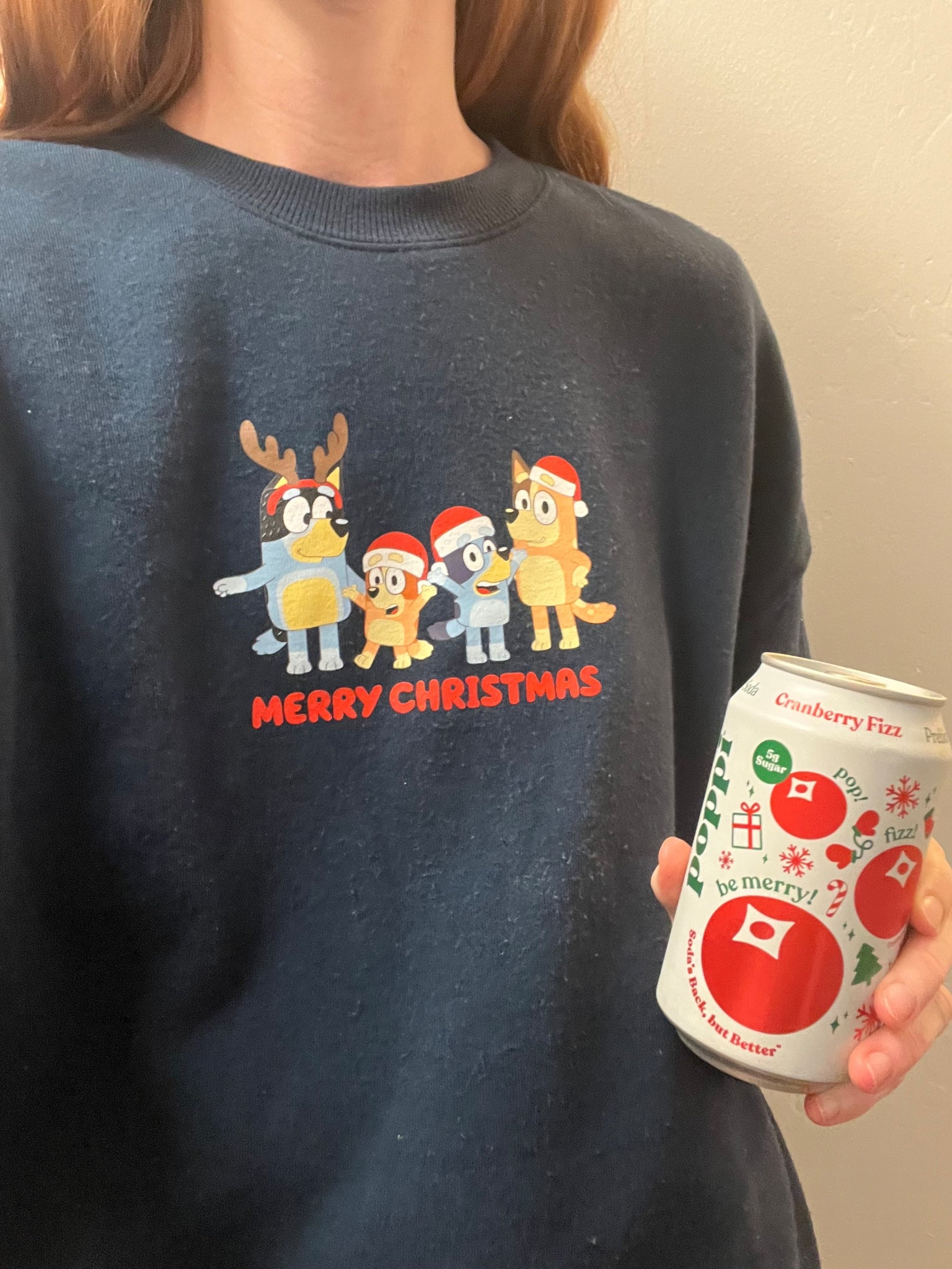 Feeling festive in my Bluey Christmas sweatshirt drinking a Cranberry Fizz Poppi 🎅 

I’m wearing size small in the sweatshirt. 

Poppi drinks are on sale on Amazon for Cyber Monday!

#LTKCyberWeek #LTKHoliday #LTKmomlife