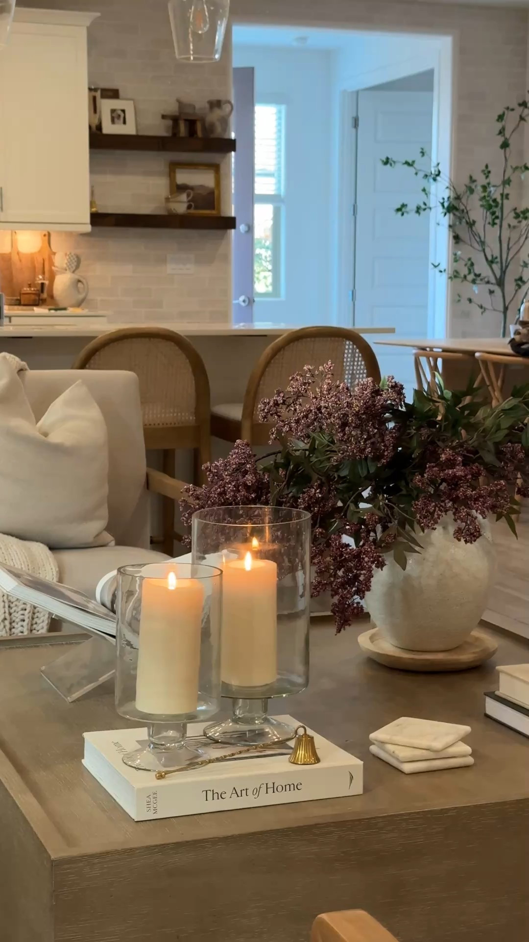 Quick living room refresh🤍 added in some hurricane vases to keep that cozy feeling 🫶🏼 such a quick way to instantly elevate your space!  #homerefresh #homedecor #livingroom #livingroominspo

#LTKHome