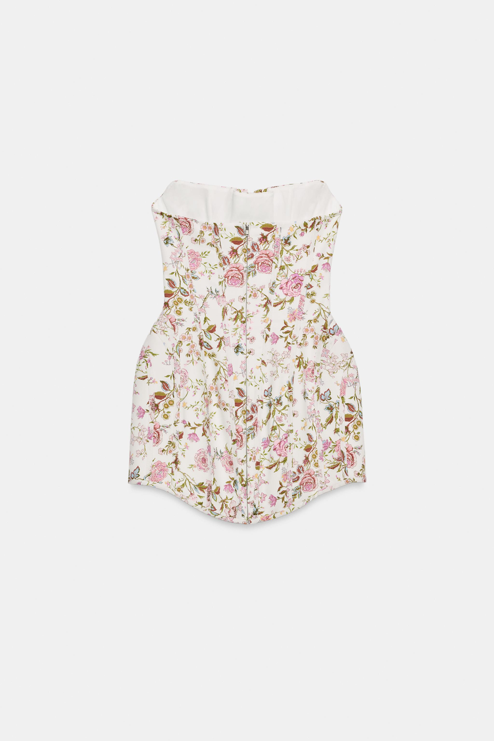 Short corset-style dress featuring a straight neckline and off-the-shoulder design. Adjustable cr... | Zara US