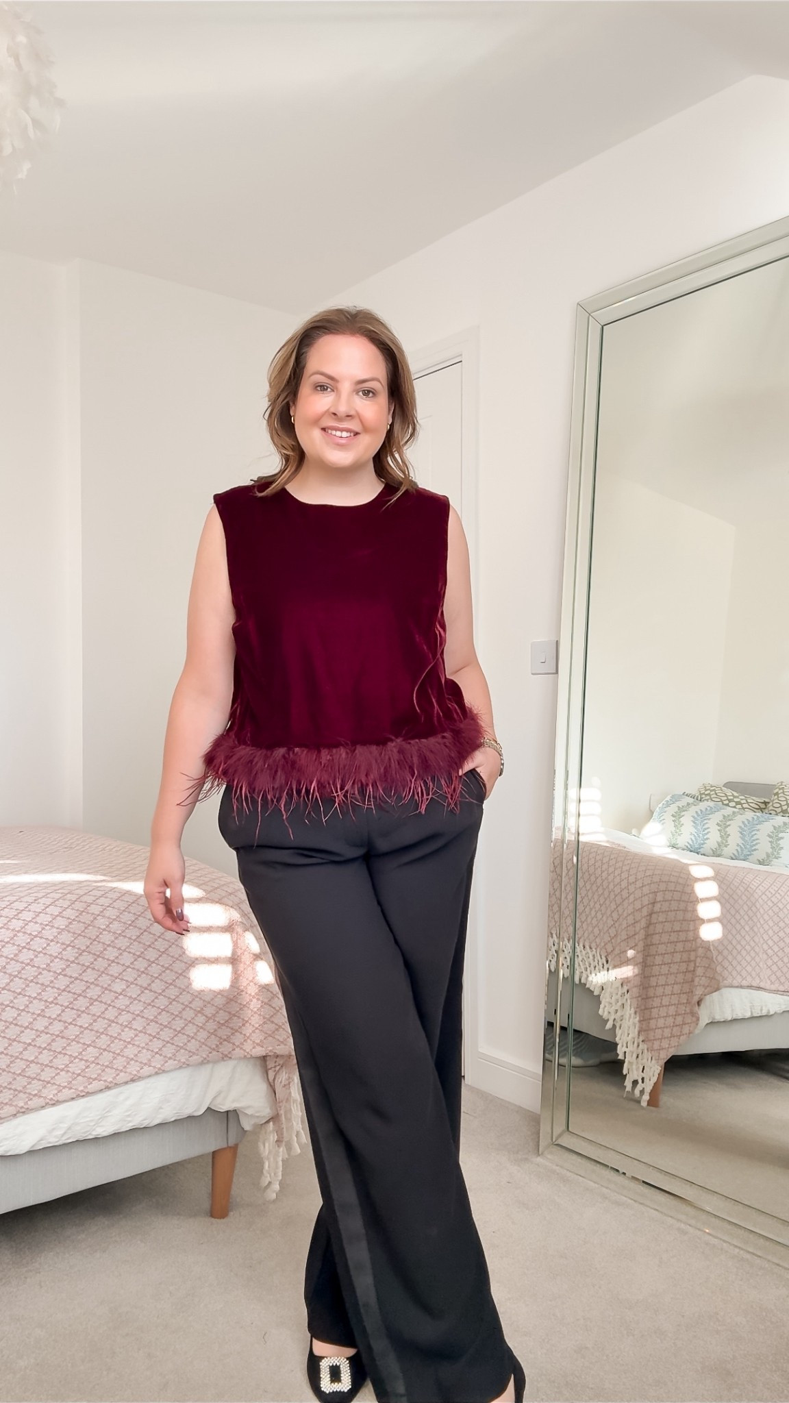 Feather top 

#LTKfestive #LTKmidsize #LTKpartywear