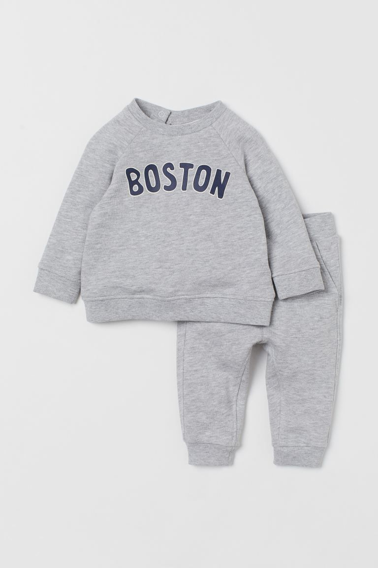 Long-sleeved sweatshirt and sweatpant joggers in cotton. Sweatshirt with snap fasteners on one sh... | H&M (US)