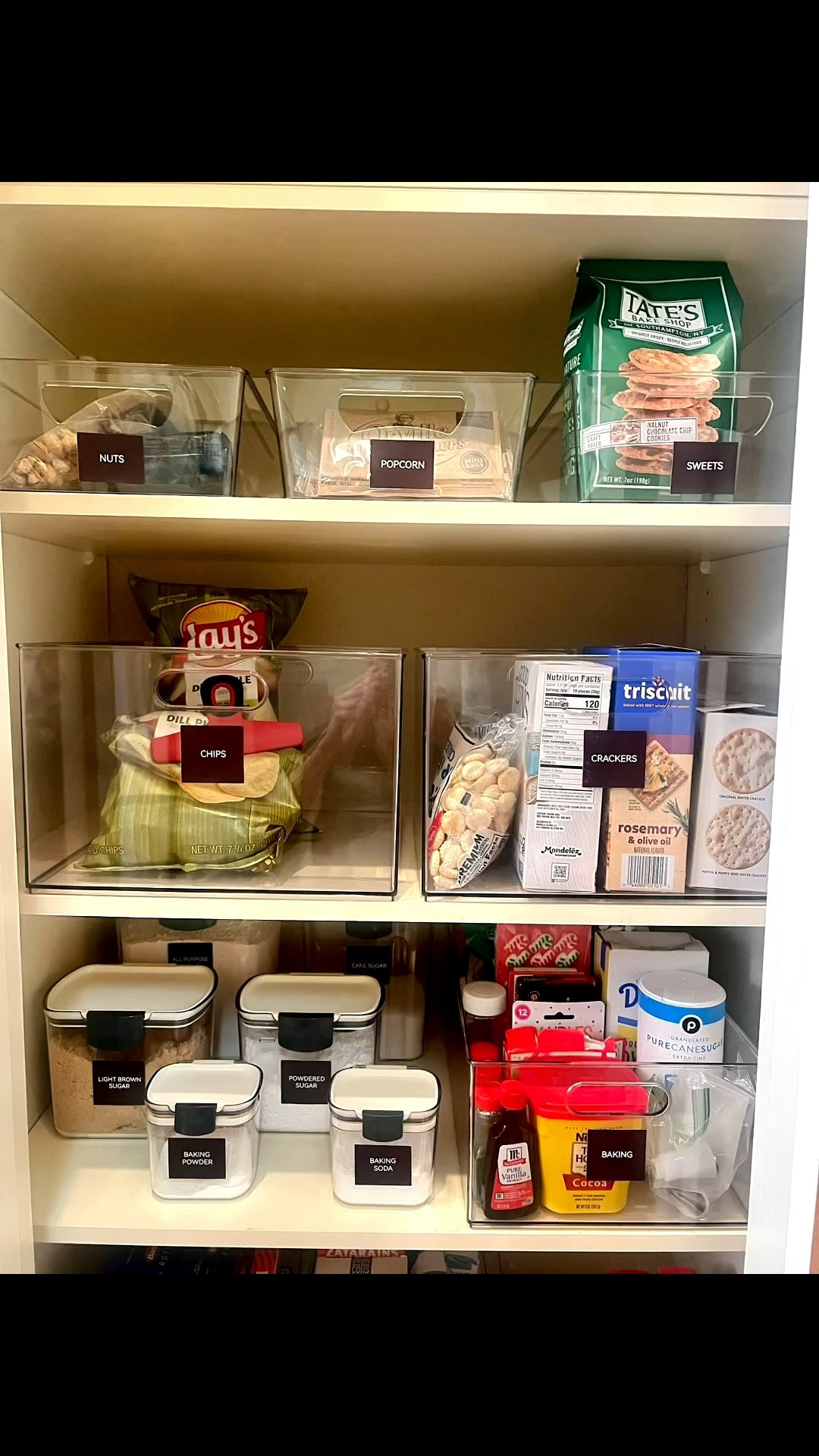 Small pantry makeover using mostly acrylic bins, per my client’s request, with a few simple canisters mixed in for the items that made sense.

We kept this one budget-friendly, functional, and easy to maintain. Nothing overly complicated, just clear categories, better visibility, and a pantry that feels calmer every time she opens the door.

#LTKHome #LTKfoodie #LTKmomlife