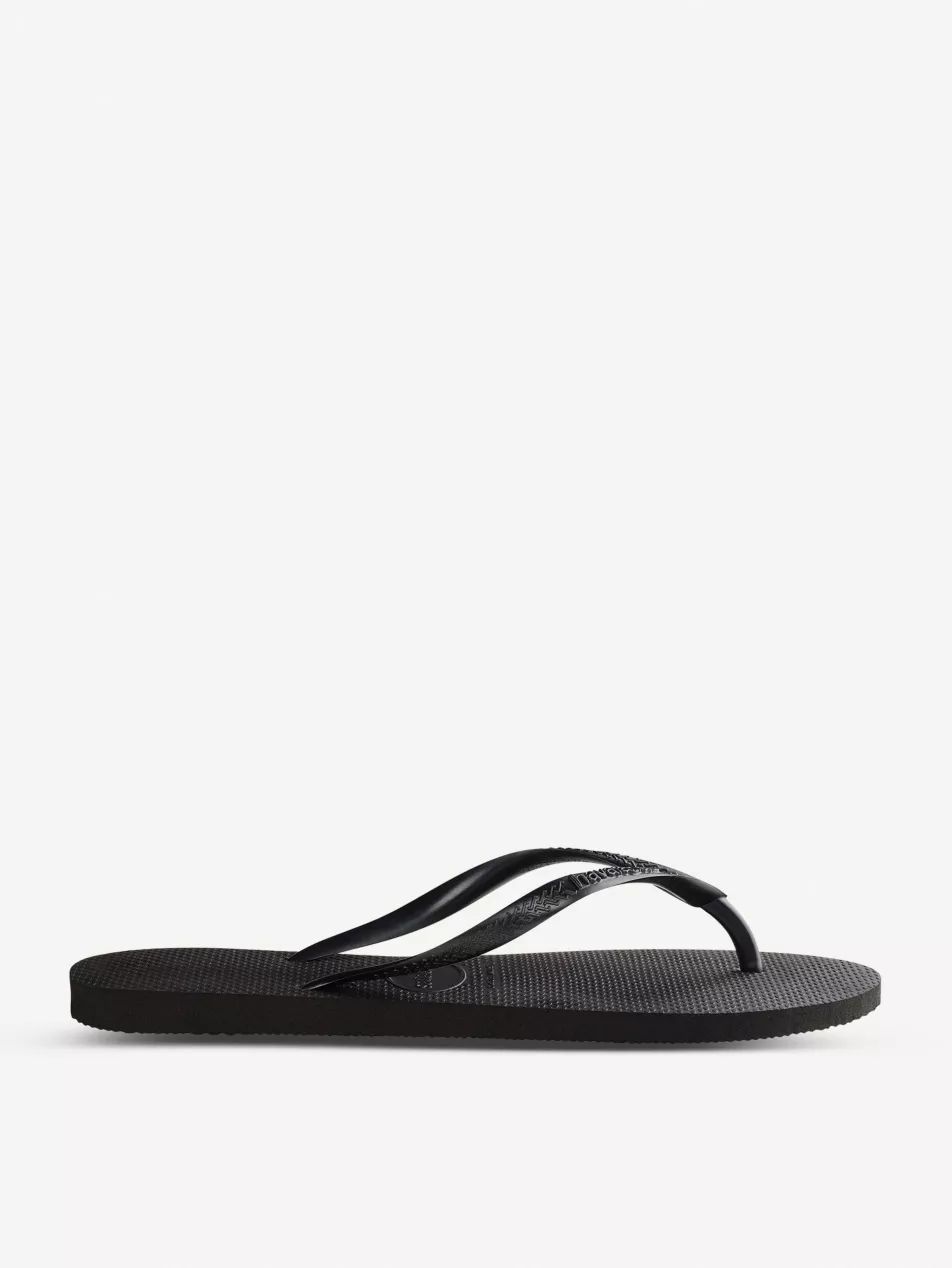 Logo-embellished rubber flip-flops | Selfridges