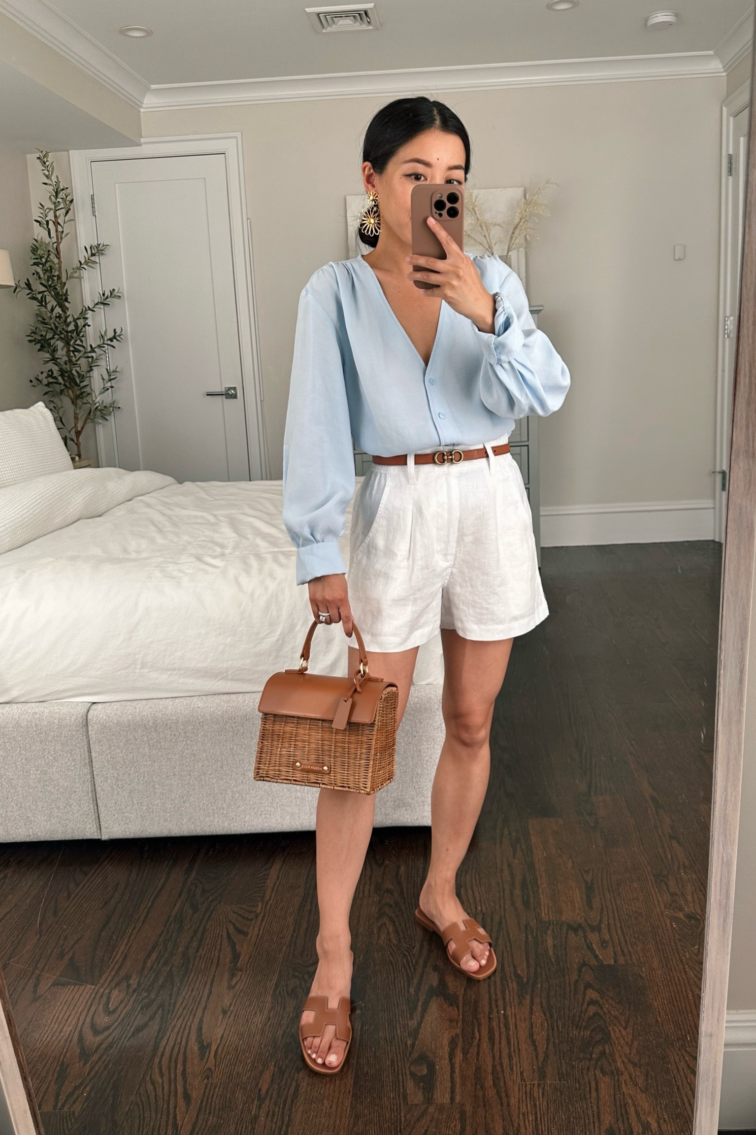 •Blouse xxs. Runs big , loose fit, and I have the sleeves folded up but so cute and drapey. Also linked the Everlane version which is lightweight and classic 

•Tailored linen shorts 00. Elastic back waist is very comfy. Great length for petites. Wear with skin toned undies. 

•Edited Pieces reversible mini belt xxs (EditedPieces.com). Just fully restocked the regular width belt!

•Modern Picnic mini bag (JEAN20 for 20% off)

•Sezane gold flower earrings . Super lightweight.

•Hermes sandals 36 - very similar look for less linked 

#petite summer casual outfit 

#LTKunder100 #LTKxNSale #LTKSeasonal