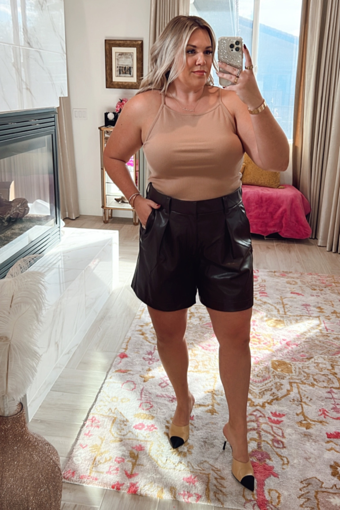curvy fall outfit! wearing size xl in tan tank top and size xl in chocolate brown faux leather shorts. could have taken the large in them! 

#LTKcurves #LTKSeasonal #LTKunder50