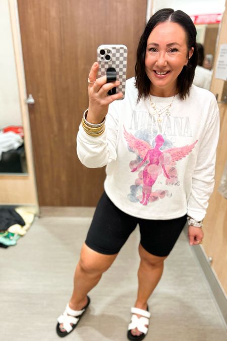 New graphic sweatshirt at Target!  Love the colors on this one!  Has a super soft fleece lining too!  XL in this one. XXL biker shorts. Sandals run tts  

#LTKOver40 #LTKSeasonal #LTKMidsize