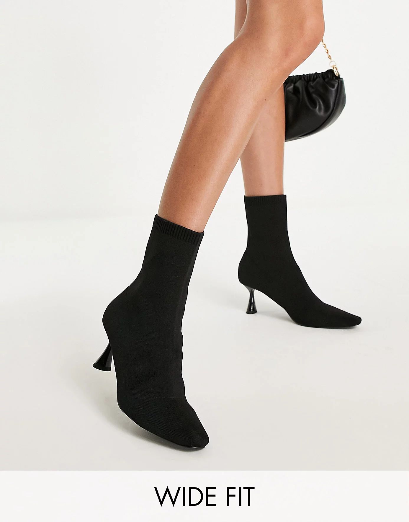 ASOS DESIGN Wide Fit Rightly knitted heeled sock boots in black | ASOS (Global)