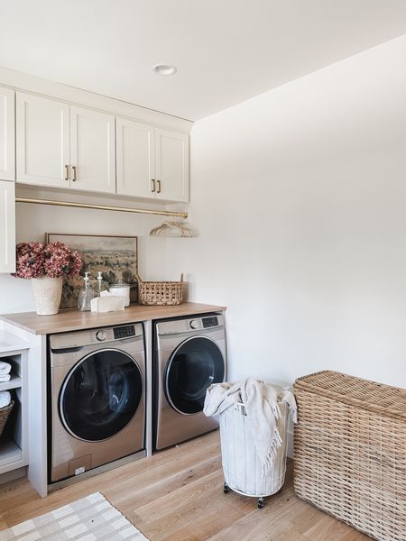 Spring laundry room details! Light and airy space with aesthetic organization and gold details

Home finds, spring refresh, laundry room details, aesthetic home, neutral home, laundry basket, velvet hanger, gold details, glass dispenser, neutral area rug, Pottery Barn style, Target, found it on Amazon, faux florals, tissue box, basket faves, organization details, shop the look!