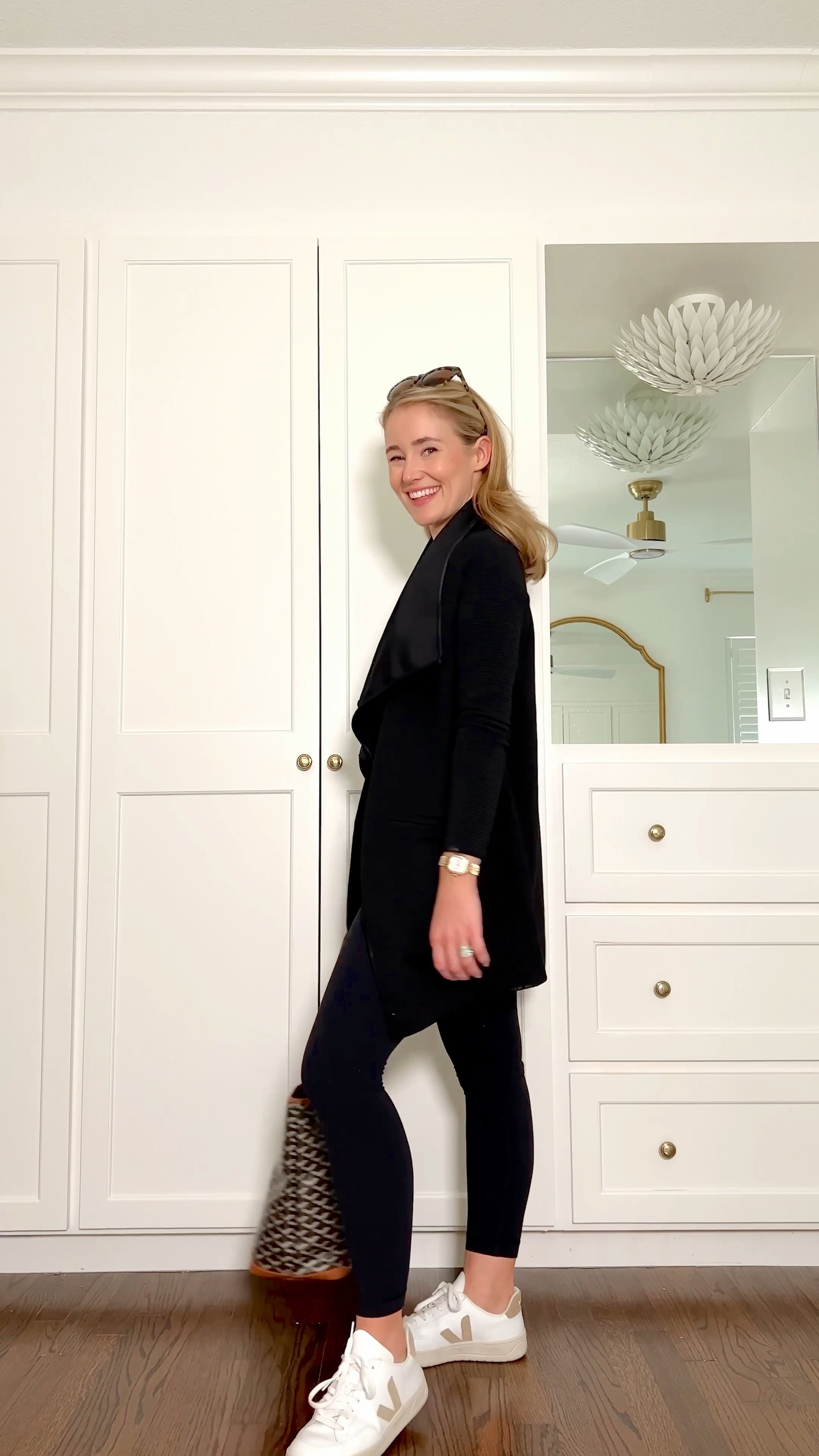 Cozy, casual autumn outfits! This all black ensemble is chic and comfortable.

SIZING & DETAILS:

Top // perfectly cropped, size one size up. 
Leggings // wearing size 6, I’m usually a 26 in jeans
Bag // goyard
Shoes // Veja v-12
Jacket // wearing size XS, fits true to size