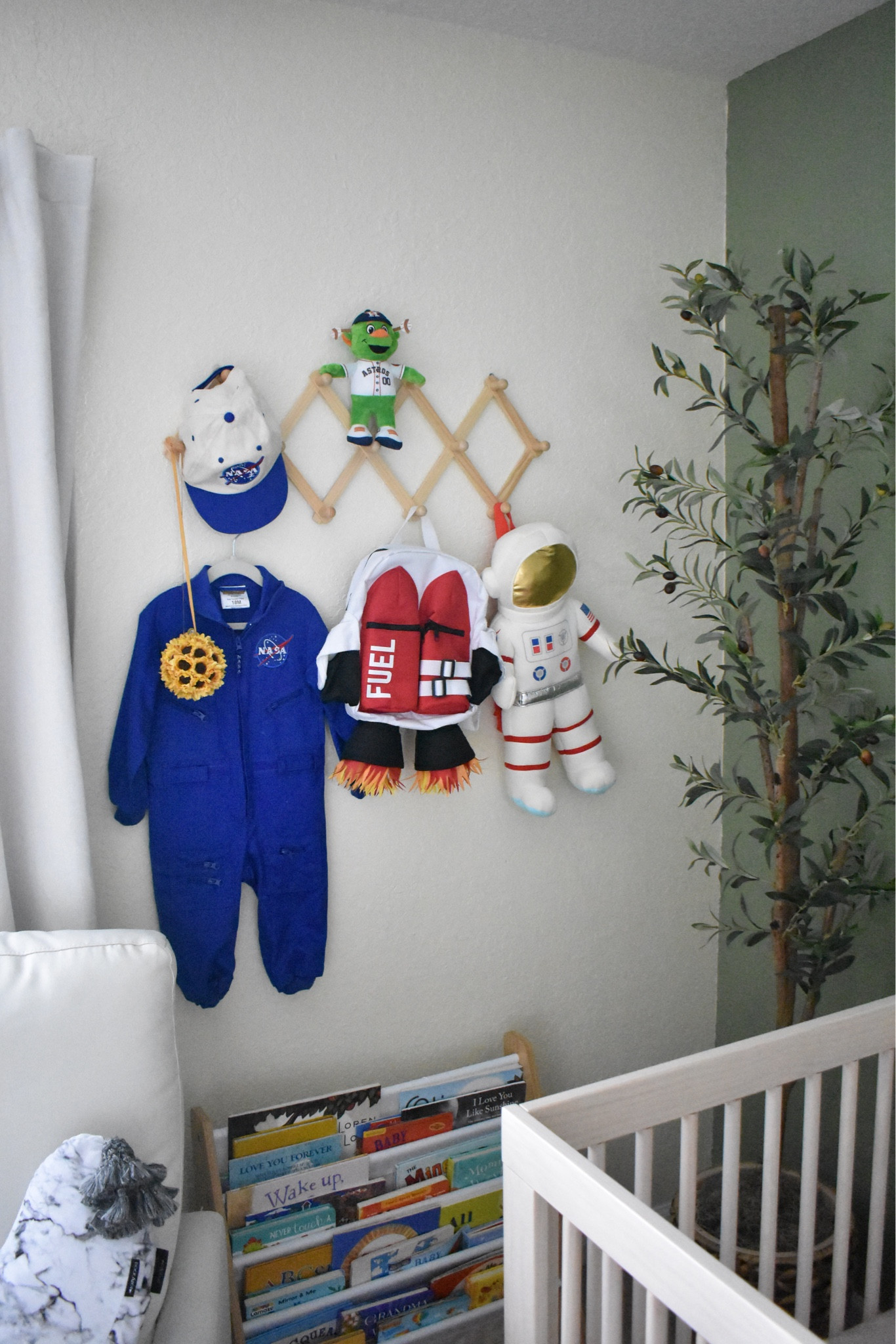 I love how this corner of my son's nursery turned out ☺️ 

Baby Nursery | Accordion Wall Hanger | Astronaut Suit | Jetpack Backpack | Astros Orbit Plush | NASA hat | NASA outfit | Olive tree | Natural Crib | Babyletto Hudson 3 in 1 | Faux Tree | Hard woven basket | Dock A Tot Nursing Wedge Pillow  

#LTKhome #LTKbaby #LTKkids