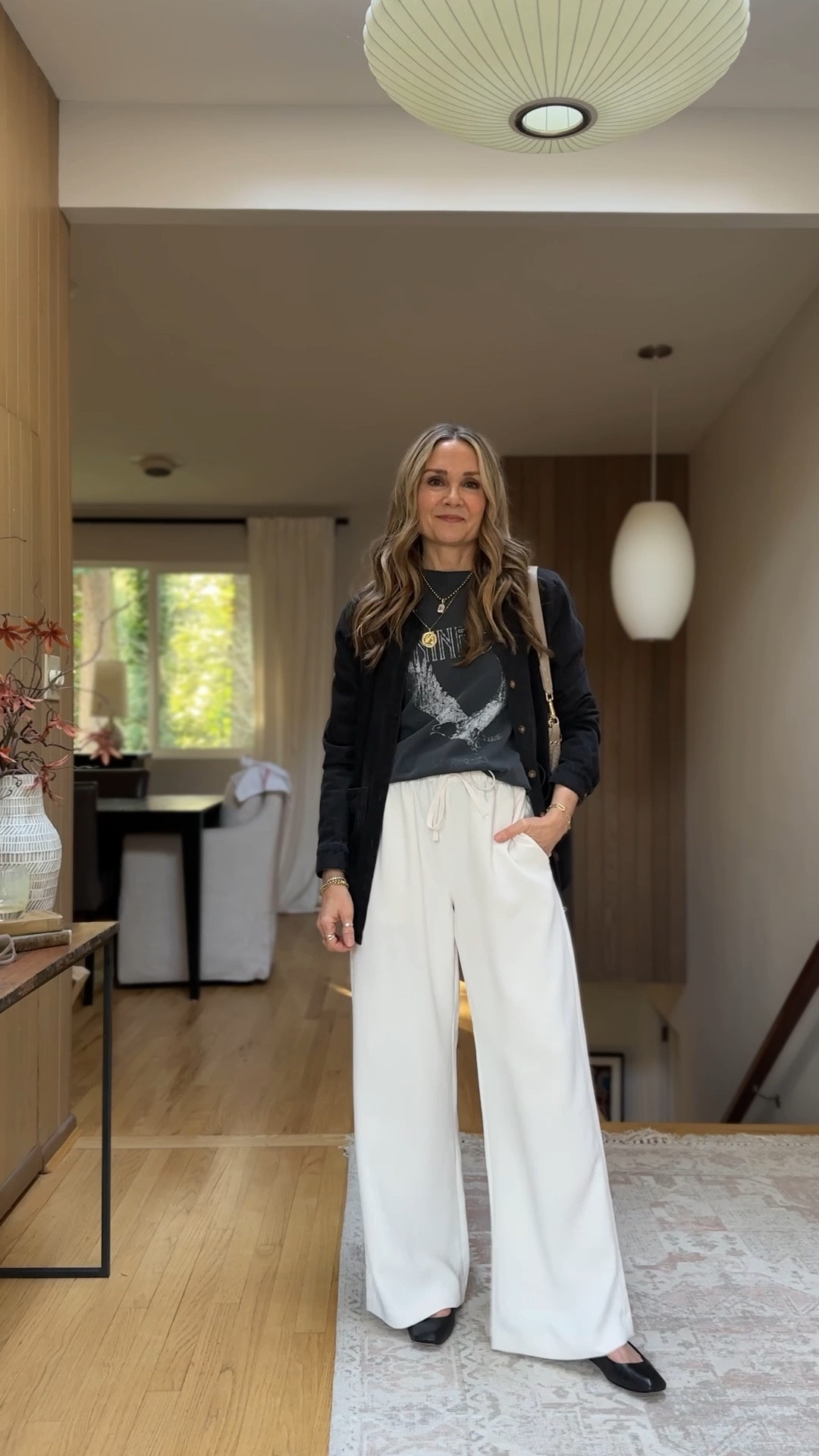 Date night outfit!
Black denim chore jacket with Anine Bing graphic tee and Aritzia Lodge pants (size medium). Quince woven bag and black Mary Jane flats. 

Spring outfit, going out outfit, work outfit office outfit 

#LTKWorkwear #LTKOver40 #LTKootd