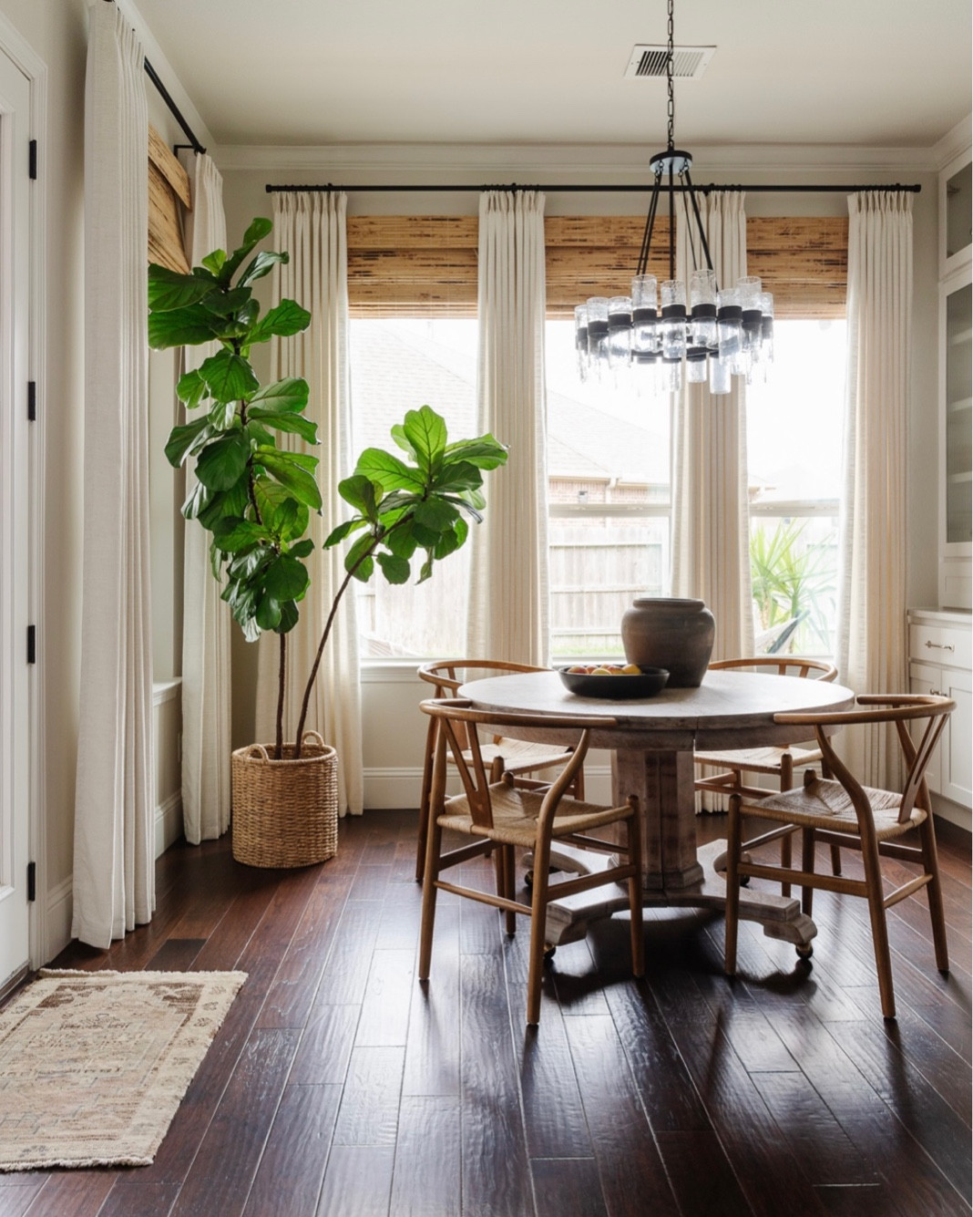 Kitchenette layered window treatments.  Bamboo blinds and neutral linen look drapes.



#LTKhome