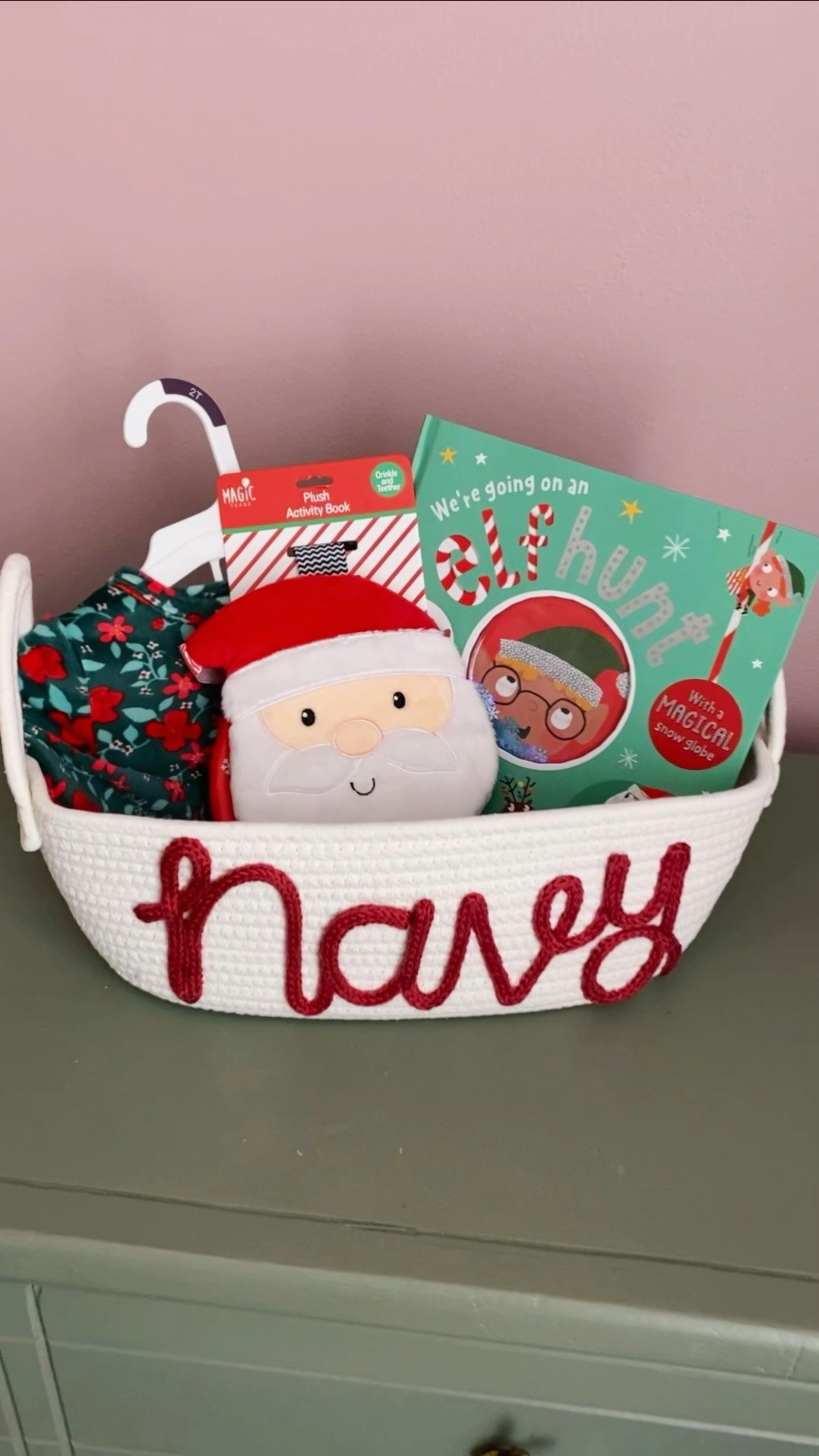 Cute baby or toddler Christmas gift basket with holiday pajamas, a fun Christmas book and a plush crinkle book to play with! Put it all in a custom name basket and it’s ready to gift. 🎁 

#LTKkids #LTKbaby #LTKGiftGuide
