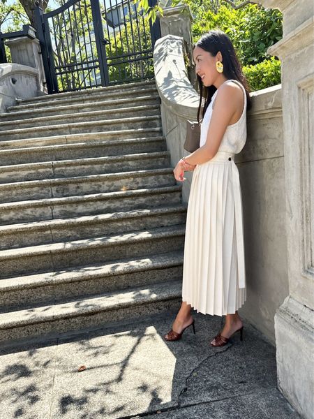 A boucle tank and pleated skirt - classic and textured, interesting and elegant. Love these pieces I found at @nordstrom #NordstromPartner 

Wearing US4 and linking to more similar items! 

#LTKWorkwear #LTKStyleTip #LTKParties