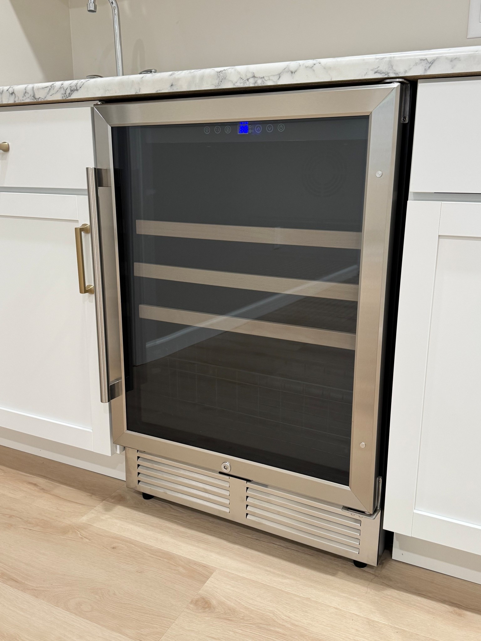 Obsessed with our mini fridge! It has digital controls, adjustable shelves, a large pull out basket, two handle choices, and a lock feature! 

#LTKHome #LTKParties