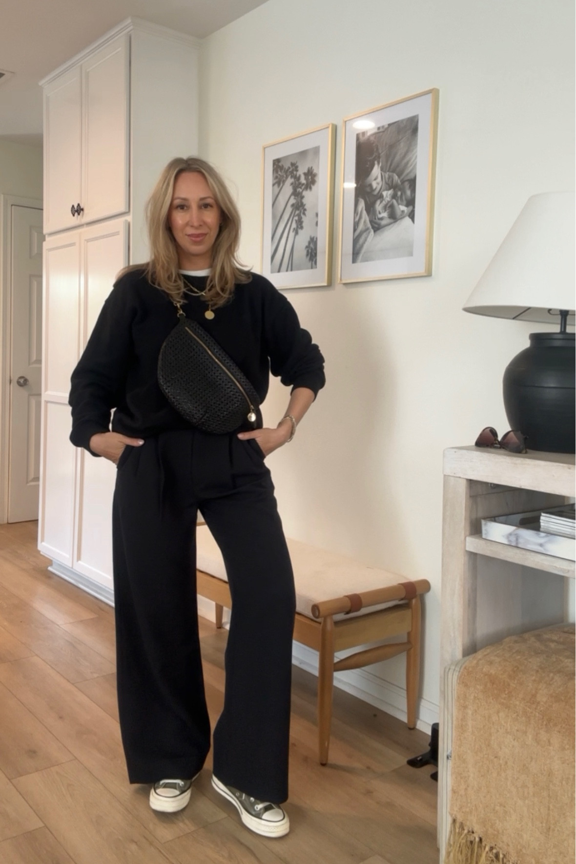 Casual outfit with black trousers capsule wardrobe but on a budget trouser pants Clare v bag sweatshirt best  white tee converse high tops moms style over 40 style #LTKMostLoved

#LTKfindsunder100 #LTKworkwear