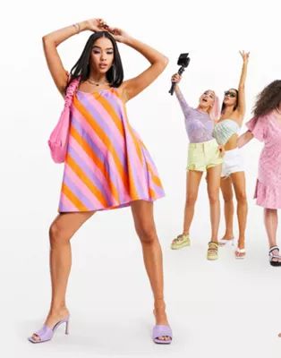 ASOS DESIGN tie shoulder halter jersey beach mini dress in bold stripe | ASOS (Global)