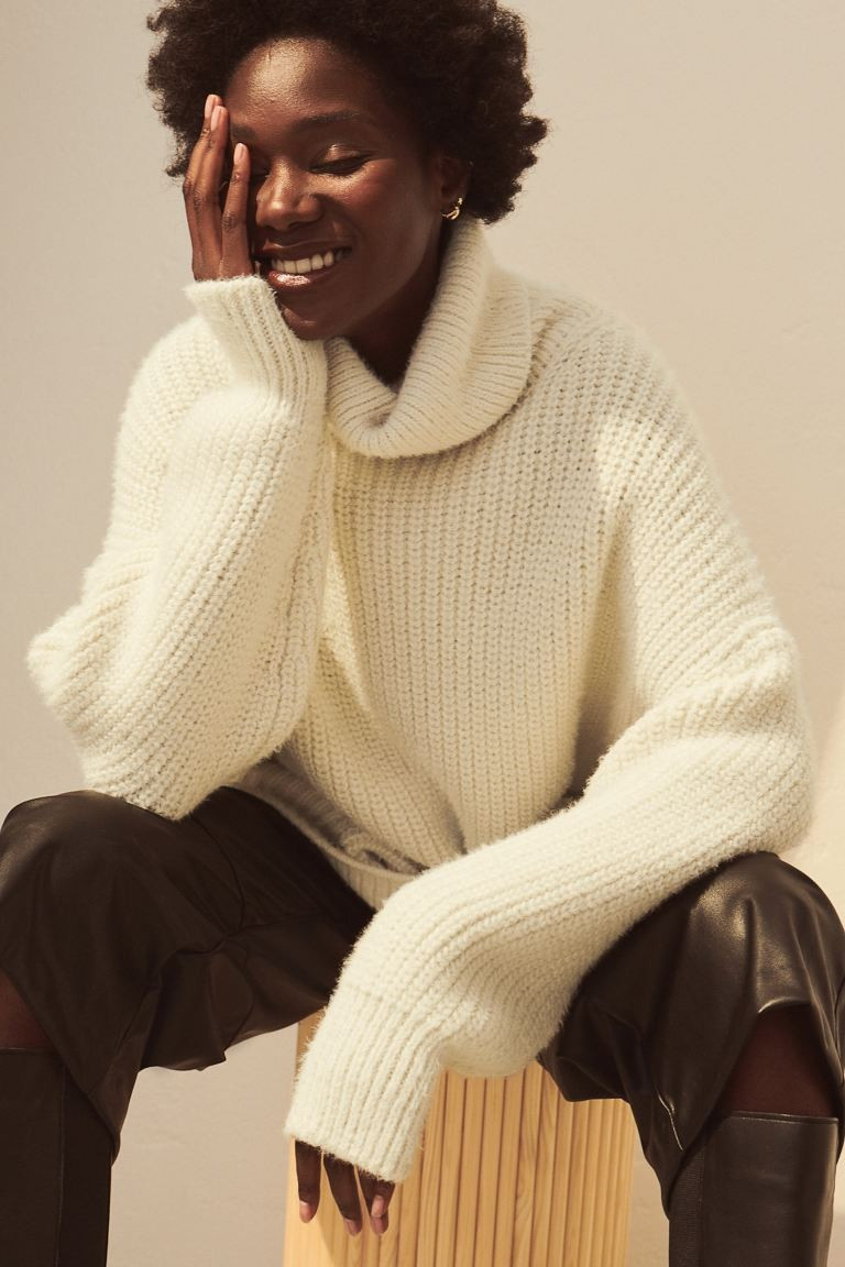 Soft, knit turtleneck sweater with wool content. Heavily dropped shoulders, long sleeves, and rib... | H&M (US + CA)