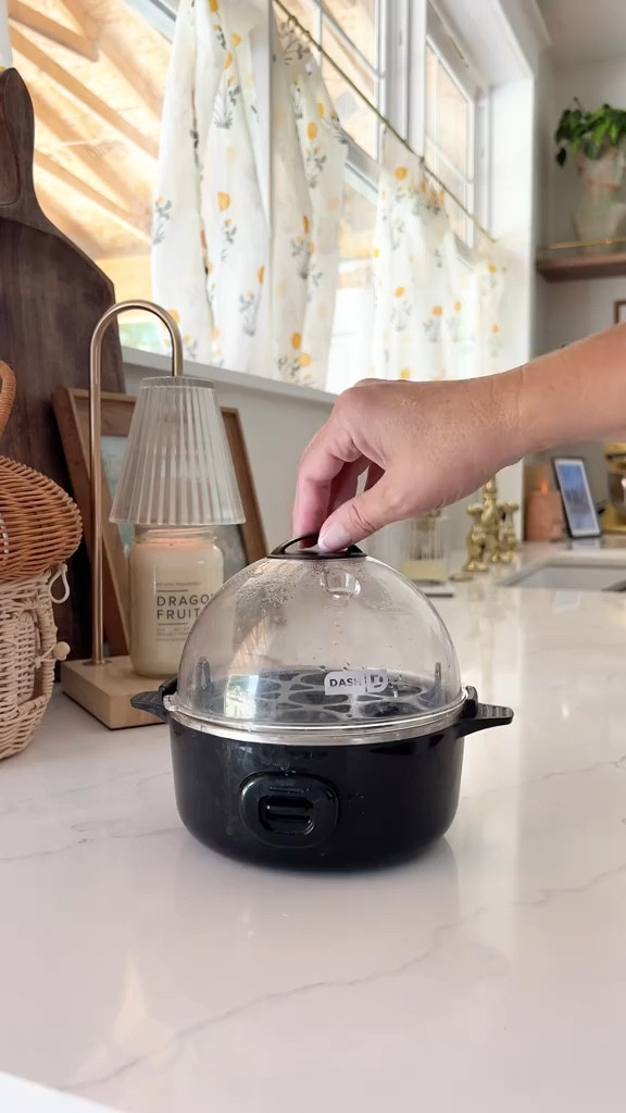Dash has the most adorable hard boiled egg maker. It’s fast and easy to use as well! We are loving it with the glass Tupperware’s as well!! 👏🏼🤍 

#LTKVideo #LTKHome #LTKBacktoSchool