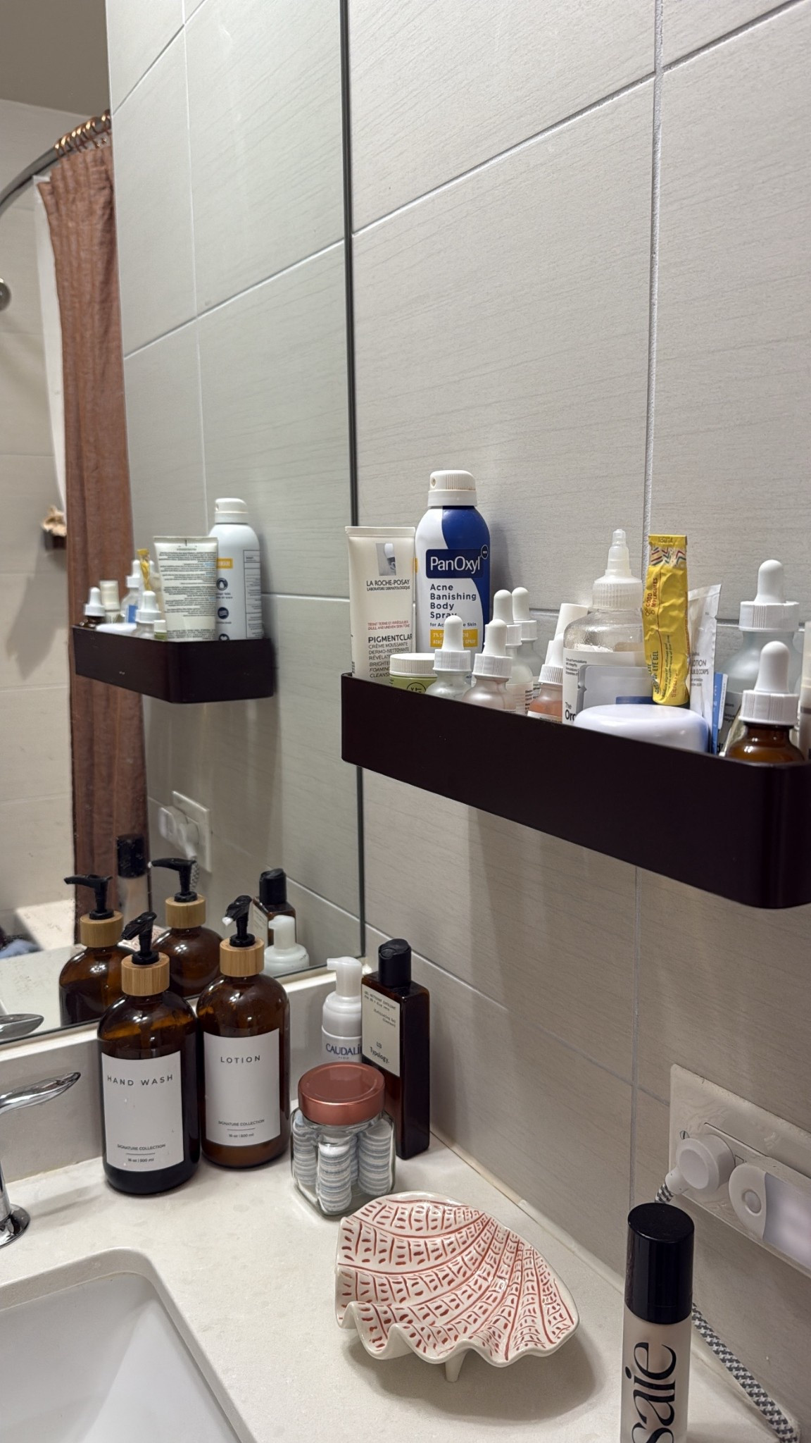 Perfect for organization! I love the color scheme of the shelf and bottles. The dark essence gives off such a relaxing vibe 

#LTKmomlife #LTKHome