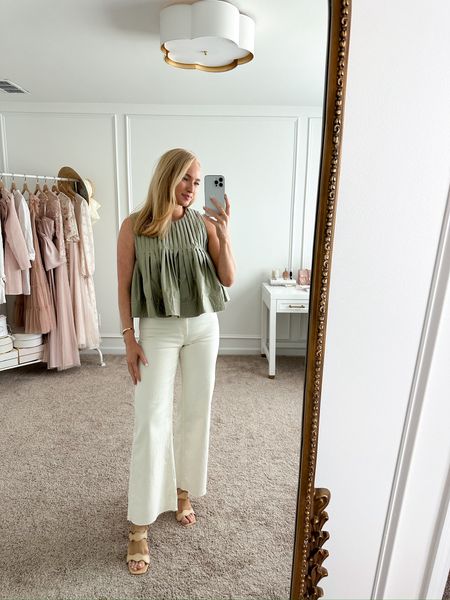 Obsessed with this Anthropolgie top! I have it paired with the Nordstrom Mango off white cropped jeans. Wearing size small in the top. I recommend size up one in the jeans. Spring outfits // summer outfits // work outfits // workwear // date night outfits // brunch outfits // Mother’s Day outfits // Anthropologie finds // white jeans // Nordstrom jeans // Nordstrom finds 

#LTKstyletip #LTKworkwear #LTKSeasonal