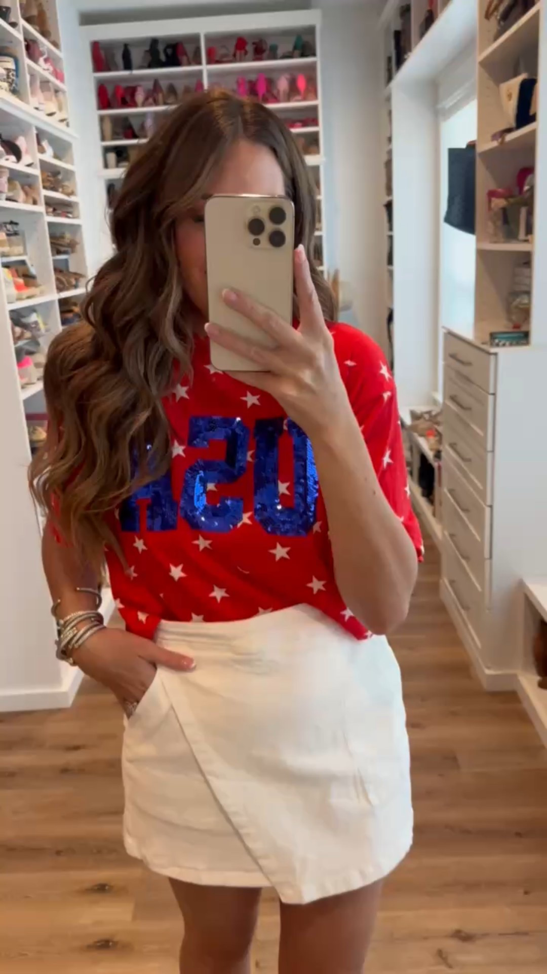 In a medium sequin USA star cropped tee, medium white denim skirt, cowboy boots and accessories for patriotic look - fits tts.

#LTKFindsUnder50 #LTKSeasonal #LTKStyleTip
