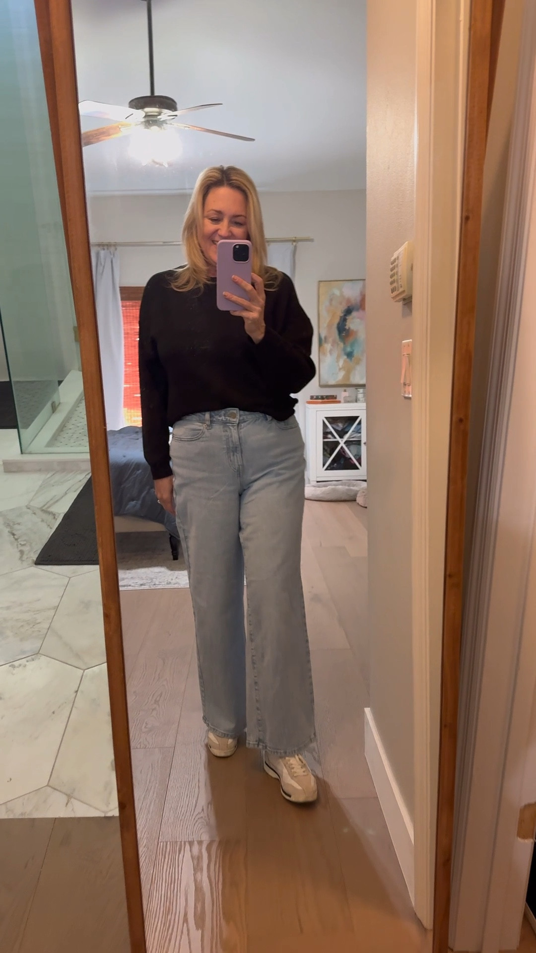 Light color high-waisted wide leg jeans under $25!  Jeans available in multiple shades and love it with this black sweatshirt ￼

#LTKootd #LTKValentine #LTKSeasonal