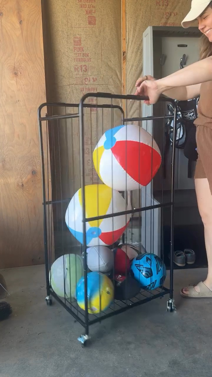 ⚽️🏀🏐 Finally, a rolling ball storage solution big enough to fit all the sports balls (even beach balls) with room to grow! It’s also super easy for your kids to grab them out the side if they can’t reach over the top! #garagestorage #sportsorganization #toyorganization

#LTKKids #LTKmomlife