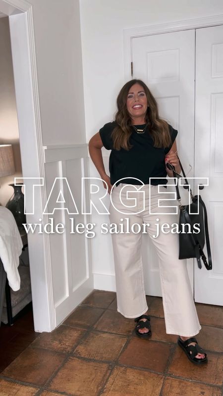 Target wide leg sailor jeans

These are so good!! I love the fit of these and they are so flattering! $28
TTS / stretch/ high rise/ tons of colors

Extended shoulder Tee
Look for less sandals
Transport leather tote - 25% off for insiders
Aviator sunglasses 



#LTKstyletip #LTKfindsunder50 #LTKover40