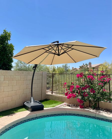 Backyard umbrella has great reviews! We are so excited to upgrade our’s this year from a free standing 50lb base umbrella to this extending large 240lb base! Love  the neutral color, too, because it goes with our patio cushions!

• backyard umbrella • pool umbrella • swimming • swim • pool day • Amazon find • 

#LTKFind #LTKhome #LTKswim