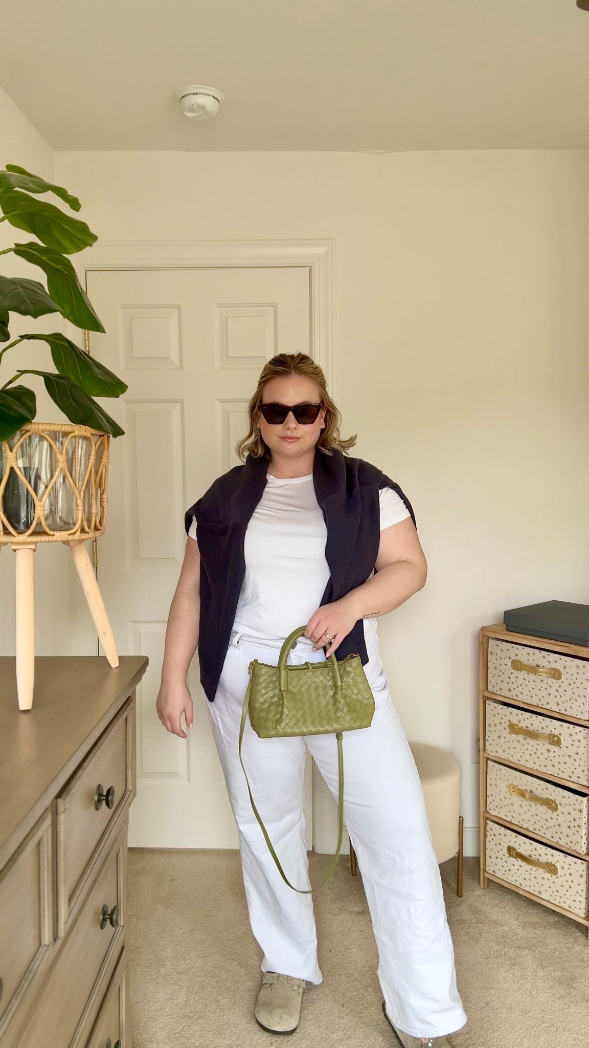 An easy spring white denim outfit 🤍 I styled my @Torrid  white jeans with a simple tee and added a navy sweater layer for that effortless, polished feel. Finished with neutral clogs and a woven green bag for a little texture. I’m wearing a 2x in the top and an 18 in the bottoms! 

plus size spring outfit • white denim outfit • Torrid outfit • white jeans styling • effortless chic outfit • casual spring outfit • curvy fashion

#LTKPlusSize #LTKgrwm #LTKSeasonal
