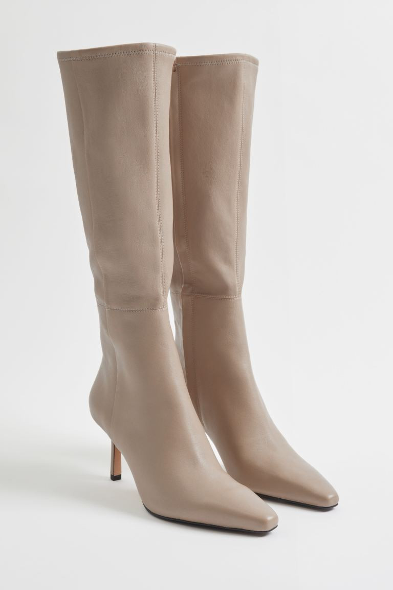 Kniehohe Sockenstiefel aus Leder | H&M (DE, AT, CH, NL, FI)