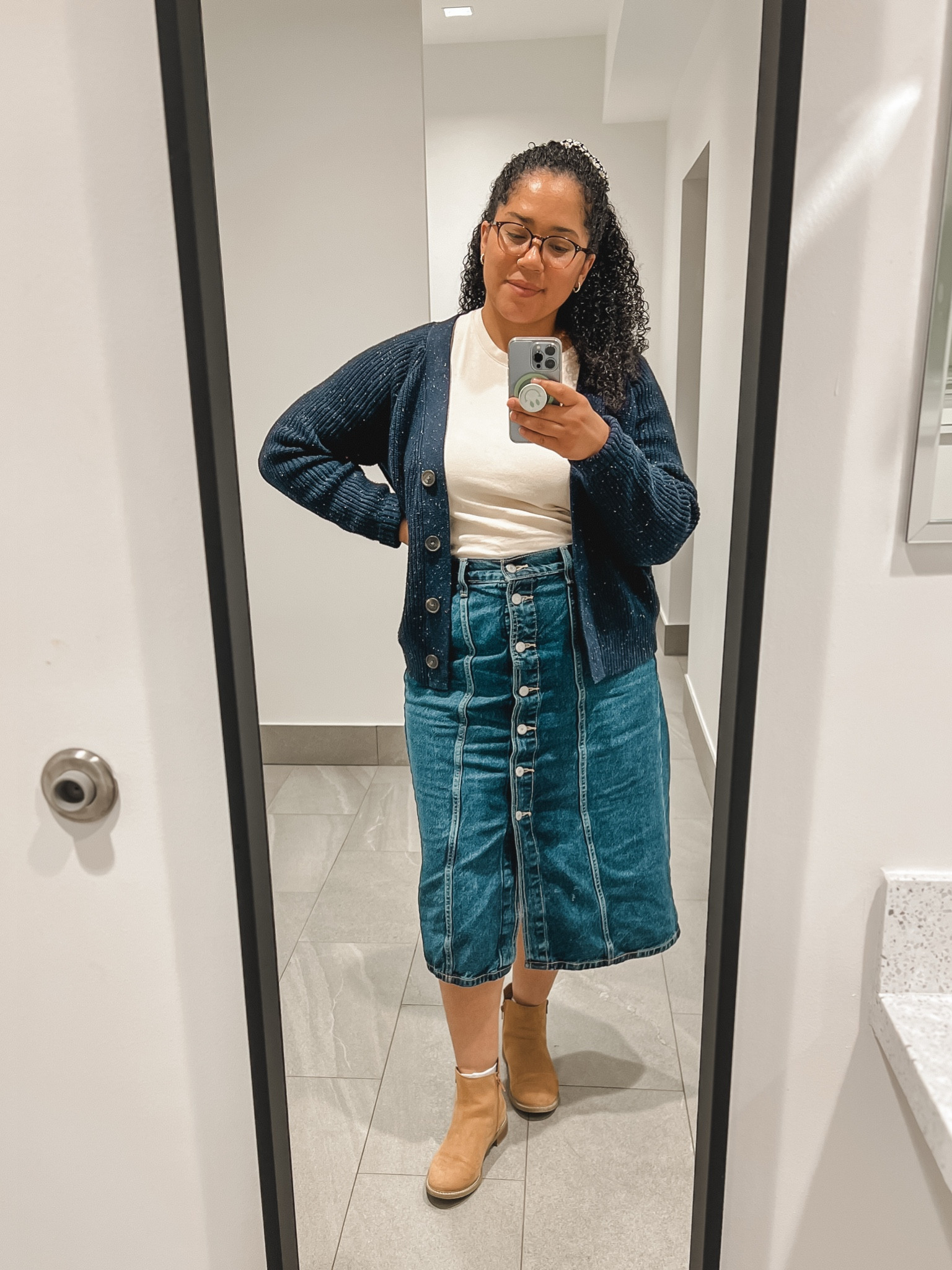 Next time I wear this, I’ll probably choose different boots, but I really loved wearing a jean skirt again for the first time in years. 

#LTKWorkwear #LTKMidsize #LTKSaleAlert