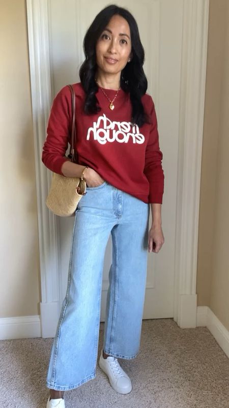 Casual outfits with graphic tees and sweatshirt and jeans from @sezane. Tops all true to size. I could’ve sized up in jeans as they are high-waisted, but I love the denim material and fit. Heart charm, chain necklace, and tote bag also from @sezane  

#LTKStyleTip #LTKOver40 #LTKFindsUnder100