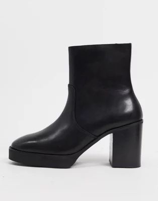 ASOS DESIGN heeled chelsea boots in black leather with black platform sole | ASOS (Global)