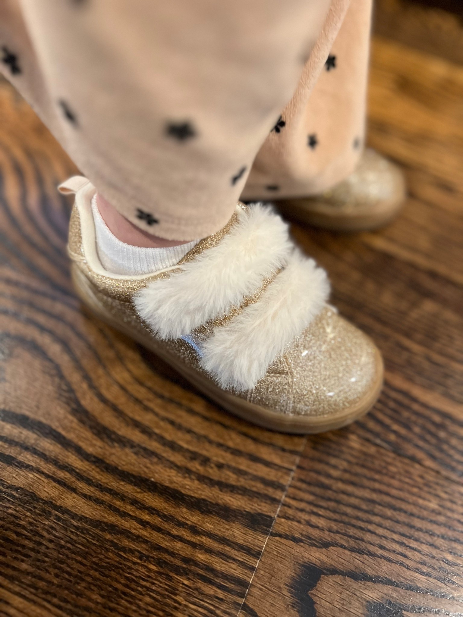 Cute toddler glittery sneakers with fuzzy Velcro straps, on sale 👟

#LTKKids
