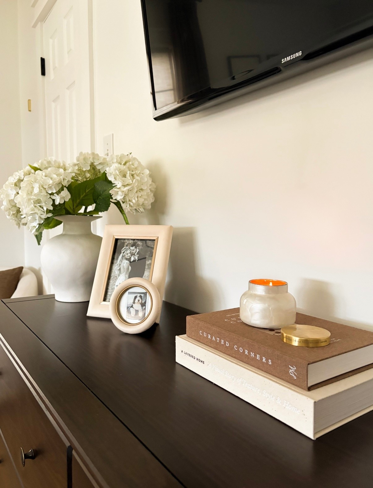 Loving these faux hydrangeas and this @Anthropologie candle 🤍🕯️

Bedroom dresser styling, Anthro home, Amazon spring florals 

#LTKHome #LTKSeasonal #LTKSaleAlert