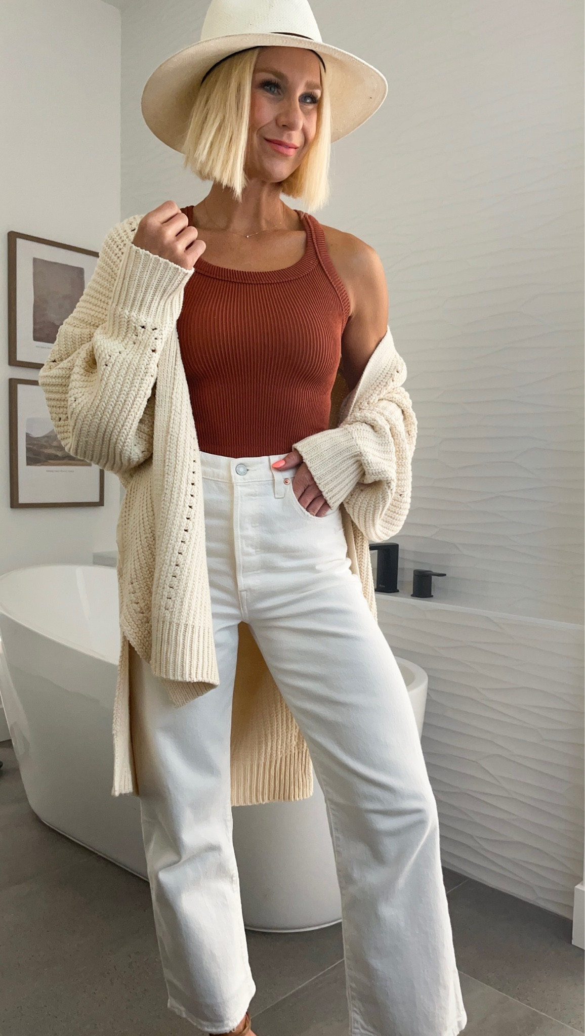 Loving rusty brown tones for fall! Wears well with whites, browns and blacks. I have loved this tank all summer and will be layering it under sweaters & flannels & shirt jackets for Fall.

Ribbed tank - wearing m/l runs small!
Jeans - wearing 27x27, considering sizing up for white jeans
Cardi- wearing small, runs oversized 

#LTKsalealert #LTKSeasonal #LTKfindsunder50