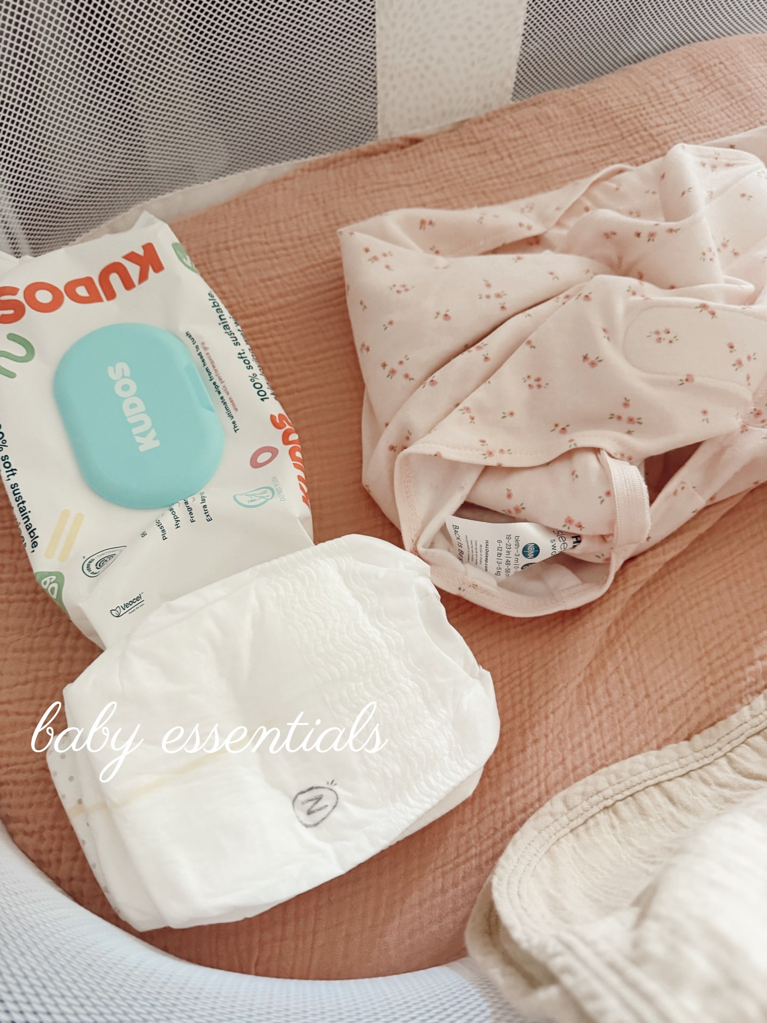@kudos wiped + @parasol newborn diapers can’t wait to use our kudos just a little big on baby still! 
And linking the swaddle we’ve been using, changing pads, and bassinet 💓✨

#LTKmomlife #LTKBaby #LTKmorningroutine