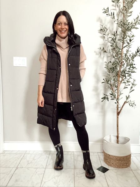 Amazon winter outfit idea with a long puffer vest, turtleneck tunic sweater, fleece lined leggings, chelsea boots and boot socks.



#LTKstyletip #LTKover40 #LTKSeasonal
