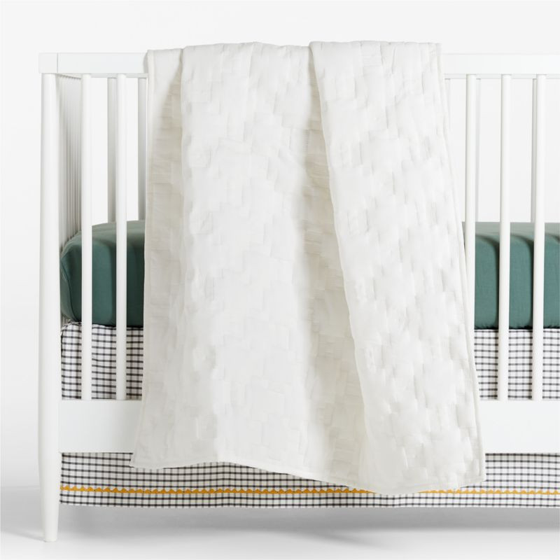 White Geometric Stitch Embroidered Cotton Baby Crib Quilt | Crate & Kids | Crate & Barrel