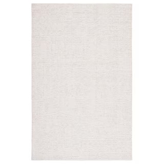 Abstract Ivory/Beige 6 ft. x 9 ft. Speckled Area Rug | The Home Depot