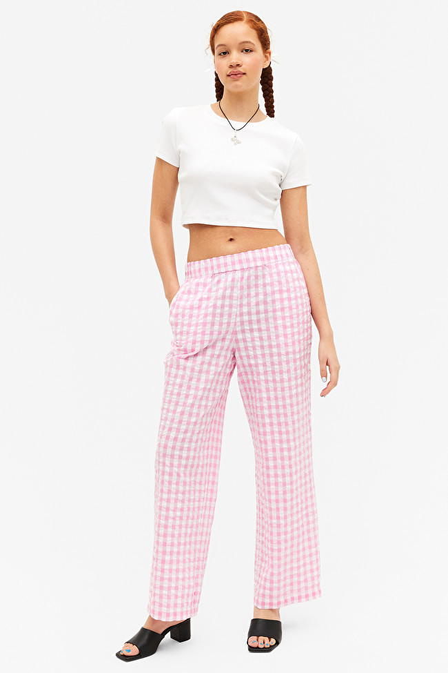 Regular waist seersucker trousers pink gingham
                  			
				£30 | Monki