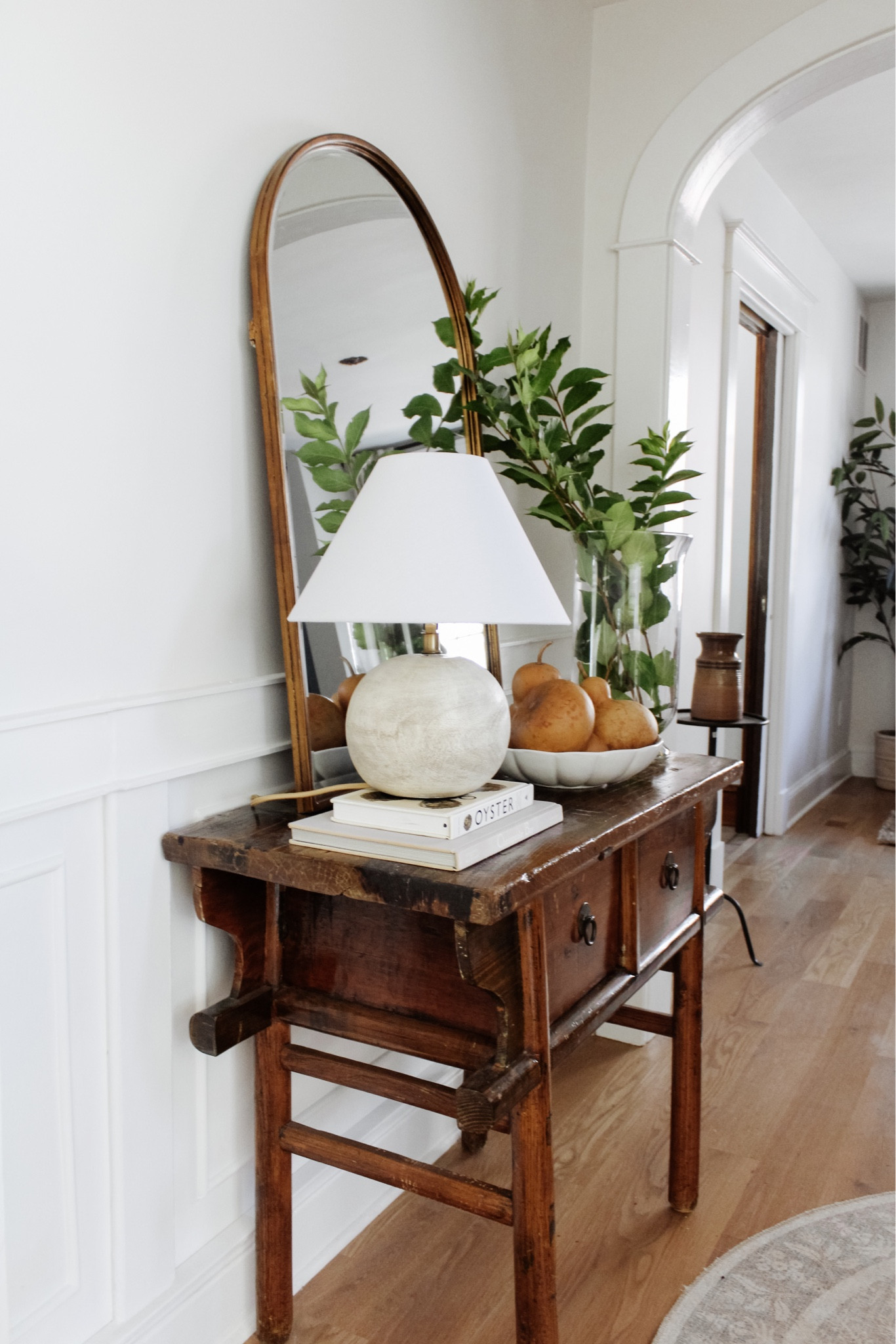 September, my favorite month to slow down and plan ✨ If you’re planning all of your Fall decor, you won’t want to miss this week’s affordable finds! Shop at the link in bio.
•
Shop my simple fall style and entry at the link in bio, too!
•
•
•

Simple fall home decor, dried gourds, seasonal decor, fall entry, fall console, tall stems, glass vase, harvest Lamp hack, magic light, amazon finds, home decor hack, entry styling Decorative ceramic bowl, arch mirror, vintage wood console, vintage wood entry table, console decor, decor books, brass mirror, table styling, affordable home decor, round entry rug, loloi rug, small lamp, round lamp, staircase landing decor 

#LTKunder50 #LTKhome #LTKSeasonal