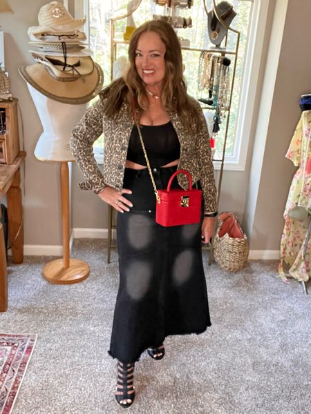 Hot trend alert! The maxi skirt! I love this black denim skirt with the flared hem and white shading.

My hero piece is this beautiful mini red purse ( my daughter tried to take it🤣)
From @labante_london. Love the color❤️, size and cross body style. 

#LTKcurves #LTKSeasonal #LTKunder50